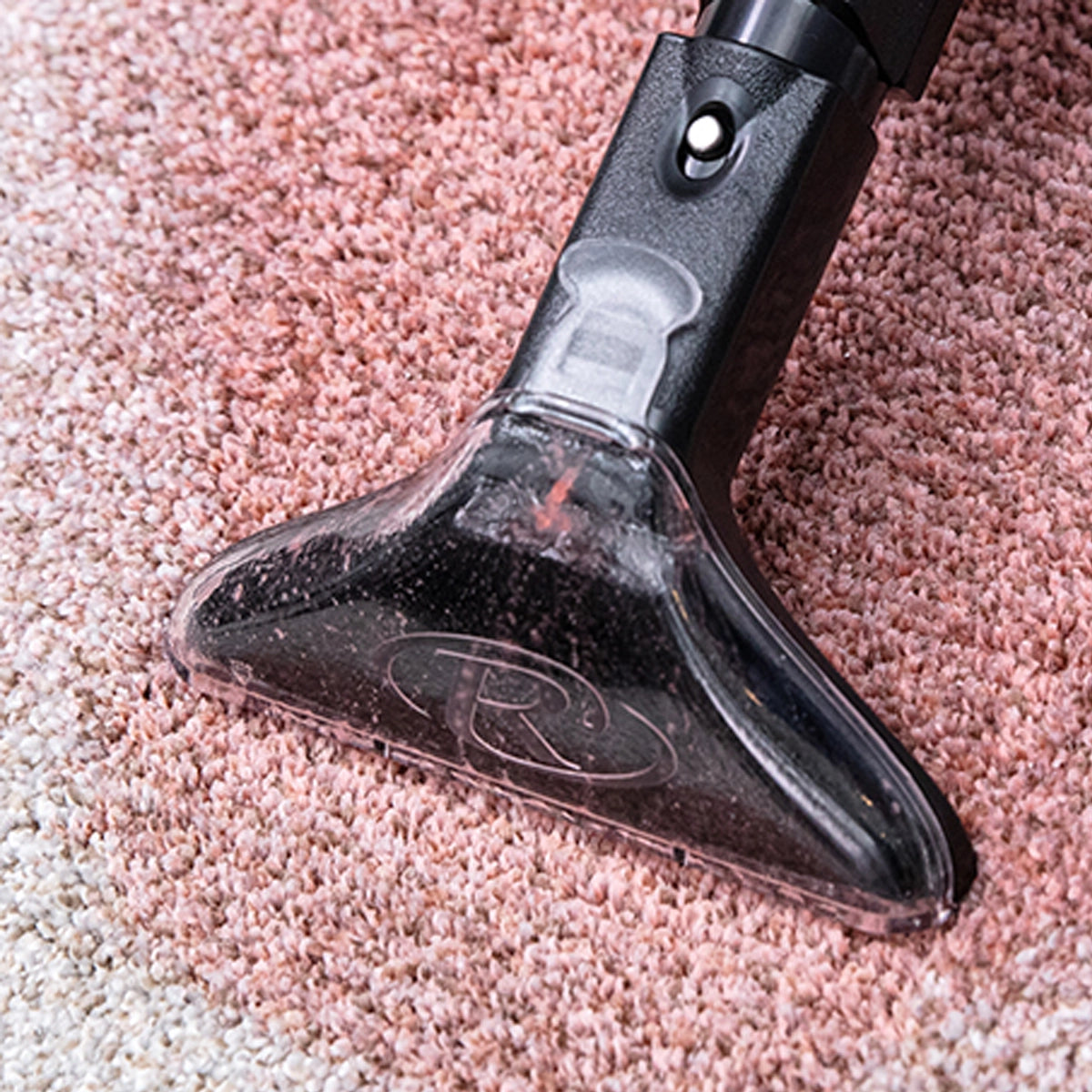MiniJet attachment cleaning spilled red wine out of carpet