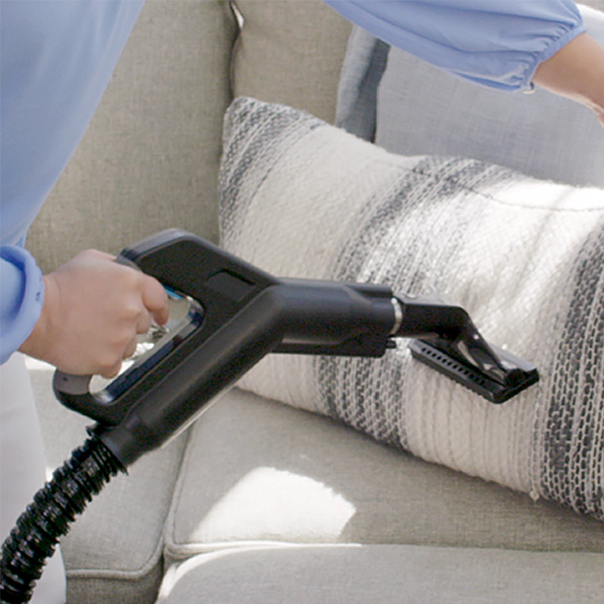 Upholstery Tool being used on throw pillows