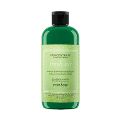 Green bottle of 'fresh air' concentrate with a black cap on a white background