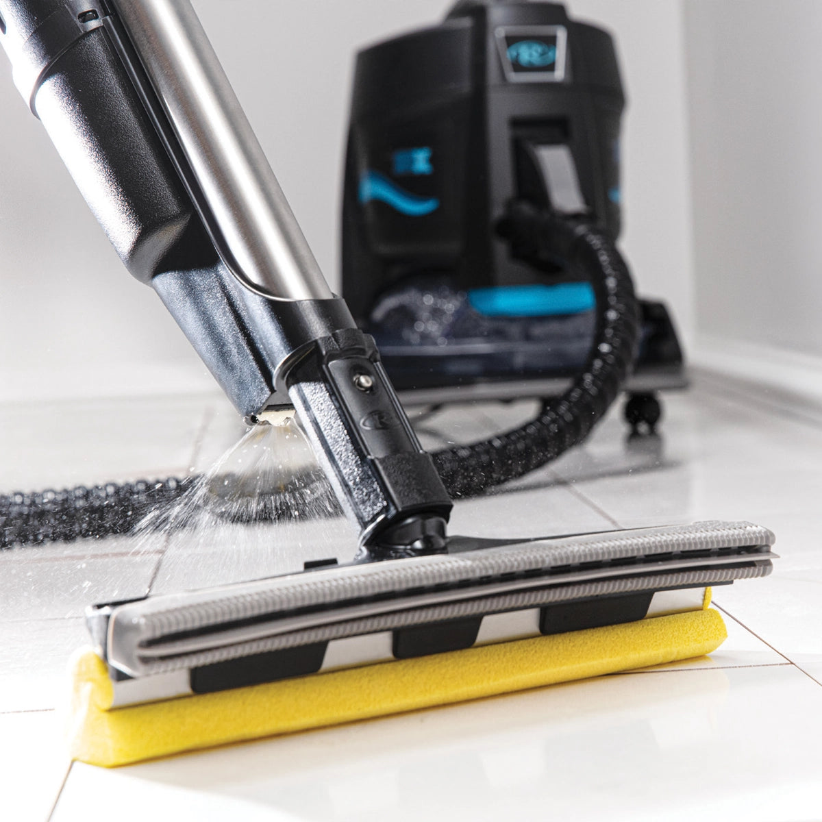 RainJet in use on white tile floor